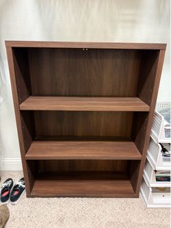 Brown wood bookcase/shoecase