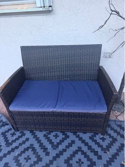 Patio Wicker Loveseat with Navy Blue Cushion – Excellent Condition