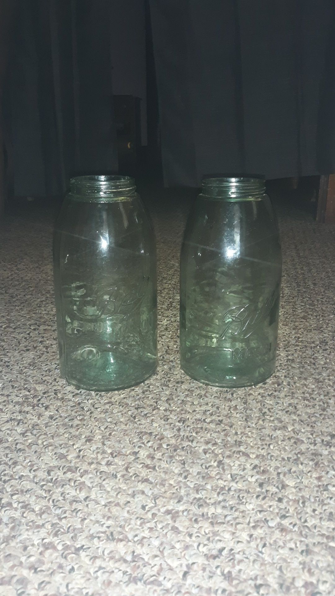 2 half gallon Ball Mason dark green tinted glass with number bottoms only 30$