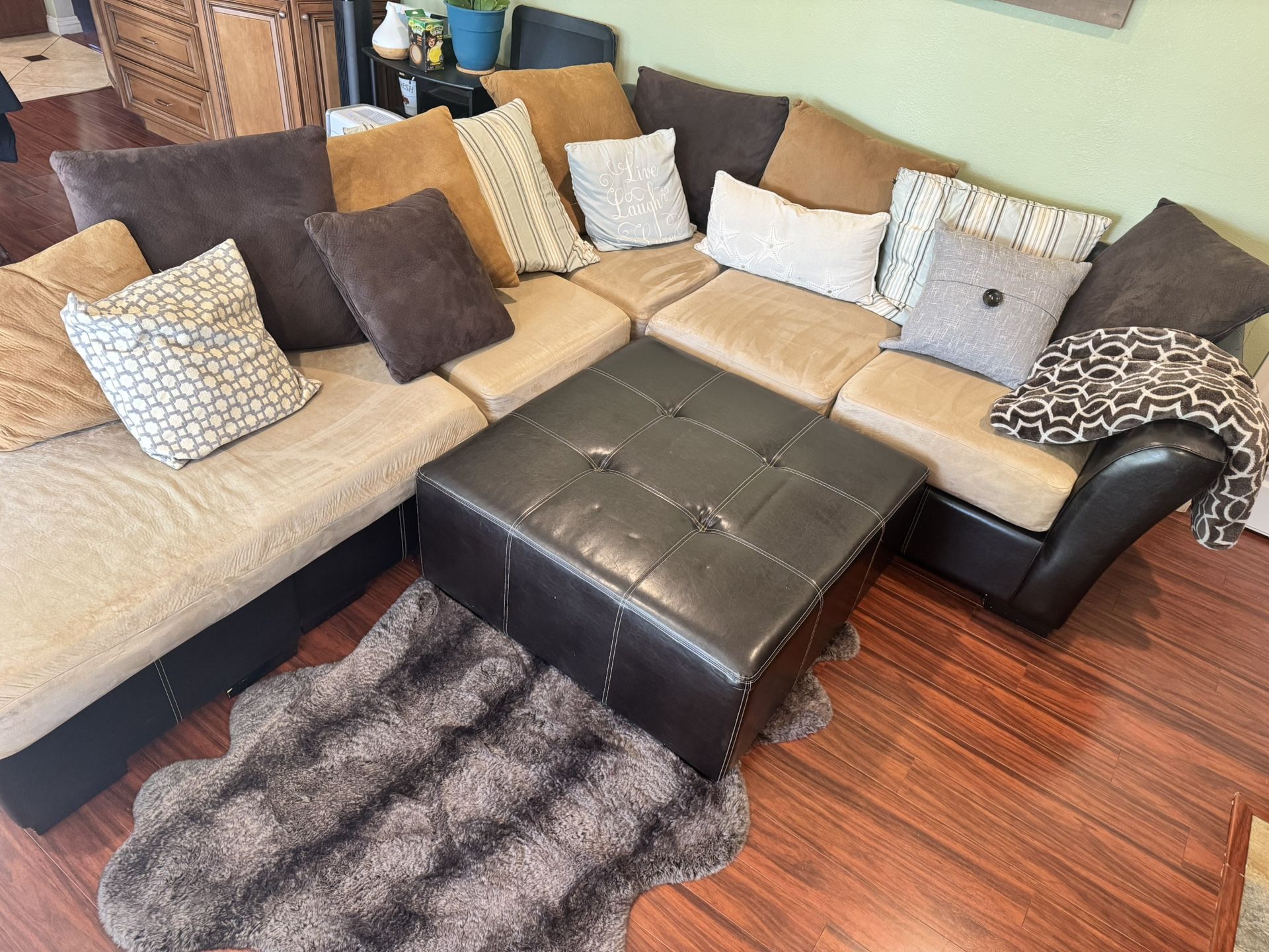 Sectional 3 Piece Couch w/pillows. Ottoman sold separately. .