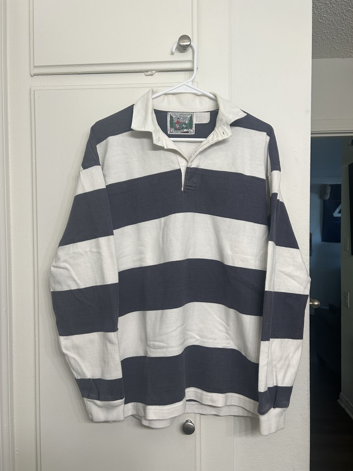 Faded Navy and White long sleeve striped collared shirt.