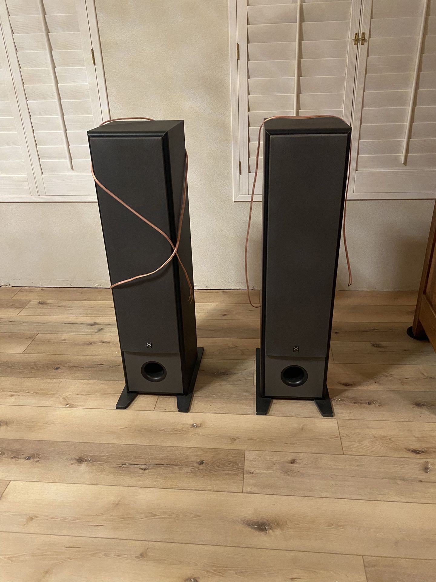 Black floor standing speakers