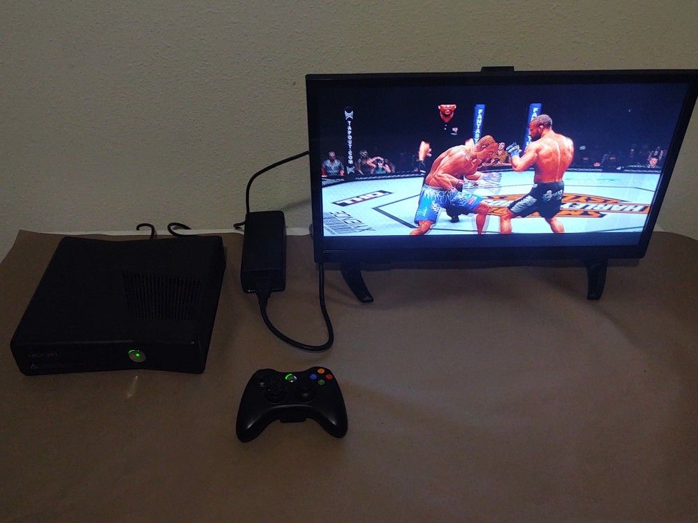 Xbox 360 Slim with Wireless Remote and UFC Game