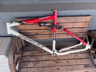 Novara 26” full suspension mountain bike frame.