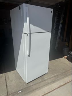Full sized fridge with top freezer