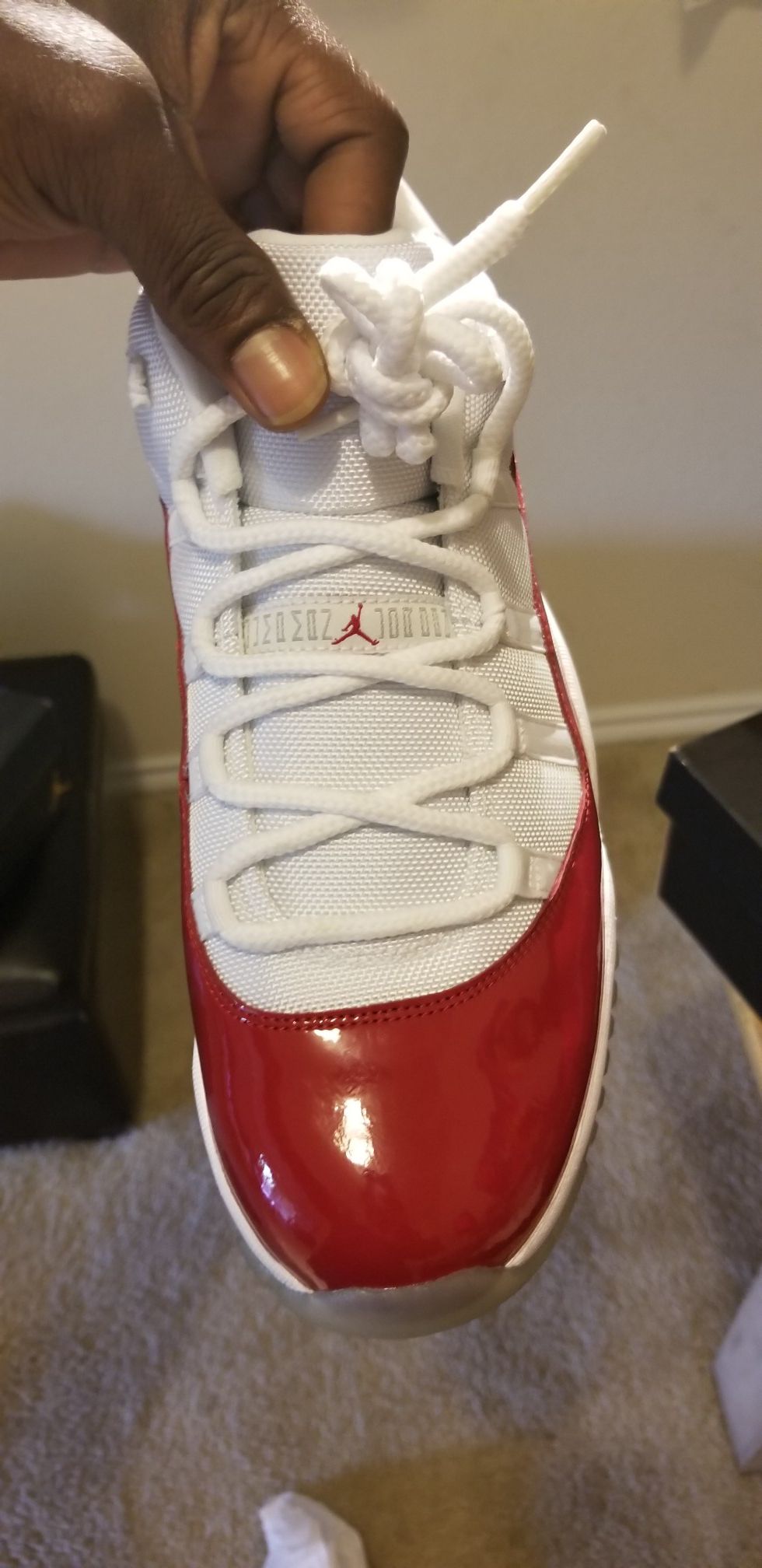 Air Jordan 11 Low "Cherry, Varsity Red"size 13. New in original box.