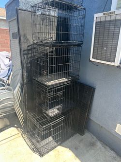 Durable metal wire dog crates in various sizes.  Cash only pick up in sun valley  I have 6 available $30 for mid size $20 for the small one on top  $4