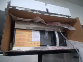 Brand new LG microwave over the range stainless steel