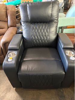 Powered recliner available $200 cash at. JE merchandise outlet