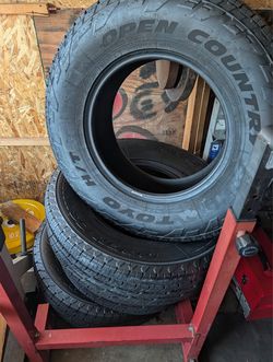 Four brand new  tires belong to a 4Runner