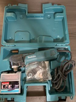 Makita TM3010C 3-Amp corded variable speed oscillating multi-tool.