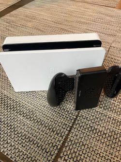 Nintendo Switch dock and controller grip