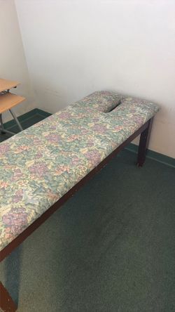 Massage table