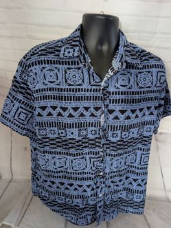 Button down men's shirt. Please see dimensions for size.