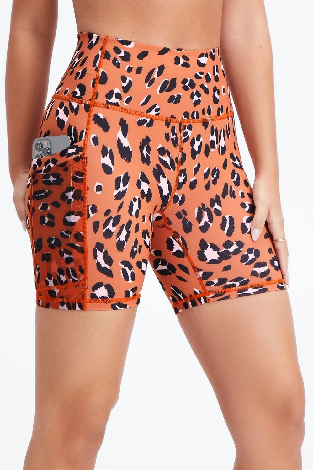 Fabletics Powerhold Orange Leopard Print Workout Shorts Women s clothing