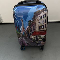 Brent, is it luggage all four sides have pictures of Paris with Eiffel towers on the two sides of the luggage very light made out of plastic fiber sof
