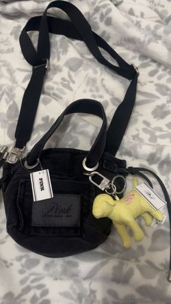 Victoria secret by pink purse and dog key chain