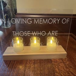 In loving memory wedding sign with candles