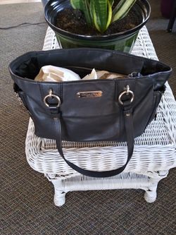 New coach purse going for 50.00