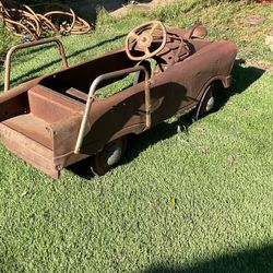 Antique Radio flyer and push pedal car