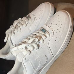 All white Nike court Vision Low