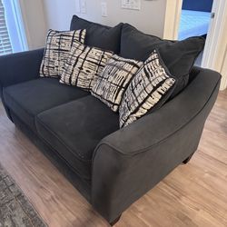 Love seat with pillows