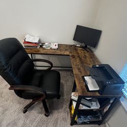 Wooden brown L-shaped desk with a rustic finish and a strong metal frame
