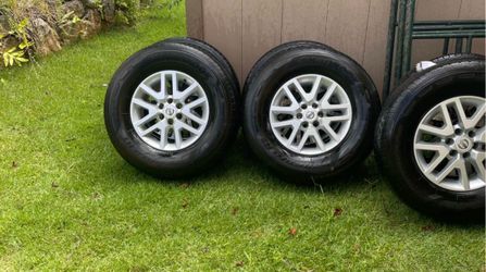 Nissan frontier stock rims and tire , size 16