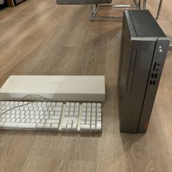 Lenovo ideaCentre And 2 Apple Keyboards