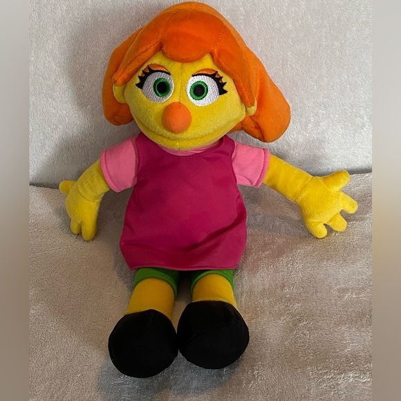This Gund Sesame Street Julia Plush, is a very cute 14stuffed toy dol that captures the essence of the beloved Muppet character. She is made of vibran