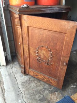 Antique sewing machine and cabinet