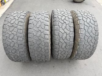 (4) 37x12.50R18 Toyo Open Country A/T III Tires