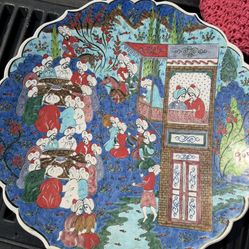 a hand-painted ceramic plate, likely a decorative produced in Kutahya, Turkey.