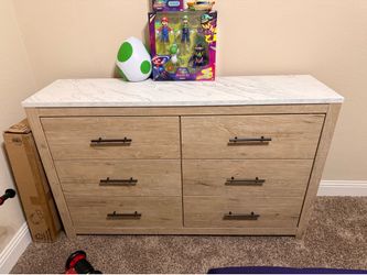 Dresser and a twin size bed