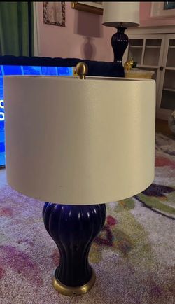 2 blue glass lamps  will sell separately