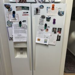 whirlpool  refrigerator approximately 10 years old in good working order including the icemaker