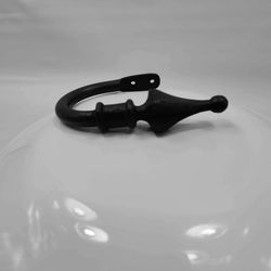 Black Cast Iron Hook with Spear Point Finial. I have two of these to offer.