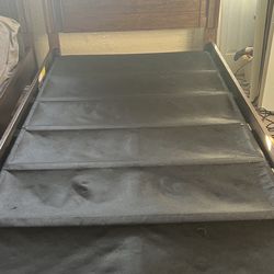 Twin bed mattress not included. It’s all wood and in great shape.