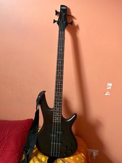Ibanez 4 string electric bass guitar with a free road runner bag