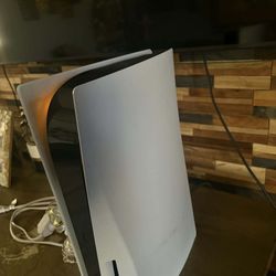 Ps5 With A Moderntv Controller And Headphones