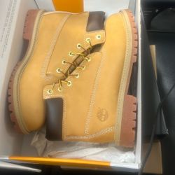 Timberland 6.5 Mid $70