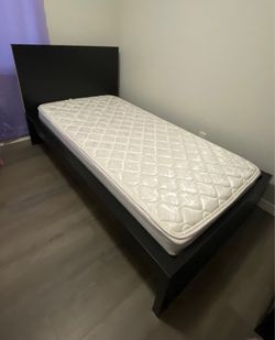 Twin bed with mattress