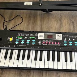Adjustable Kids Piano Keyboard 61 Keys New W/charger 