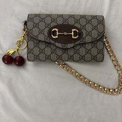 Gucci Brown And Gold Cluth With Monogram Design