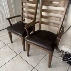 Pair Of Solid Wood Arm Chairs