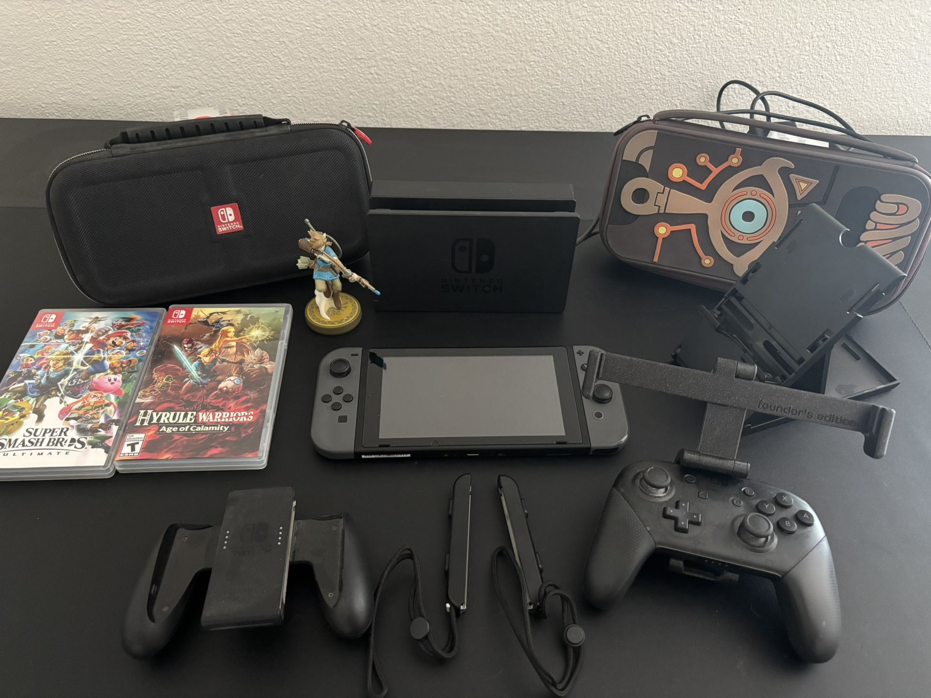 Nintendo Switch V1, HAC-001 with Dock, Case, Holders, And Two Switch Games Lot