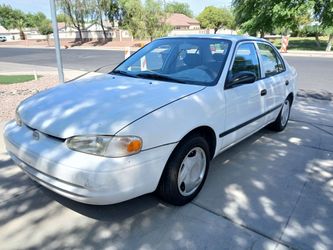 1998 toyota corolla -low 140k miles, new ac system, 2028 emissions,  drives like new! Bring any mechanic for an inspection! 38 mpgs, non smoker, well 
