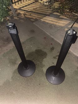 Two Lavi Industries Beltrac Retractable Belt Barrier