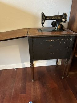 Cabinet With Vintage Sewing Machine