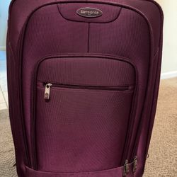 Used Purple Samsonite Luggage 